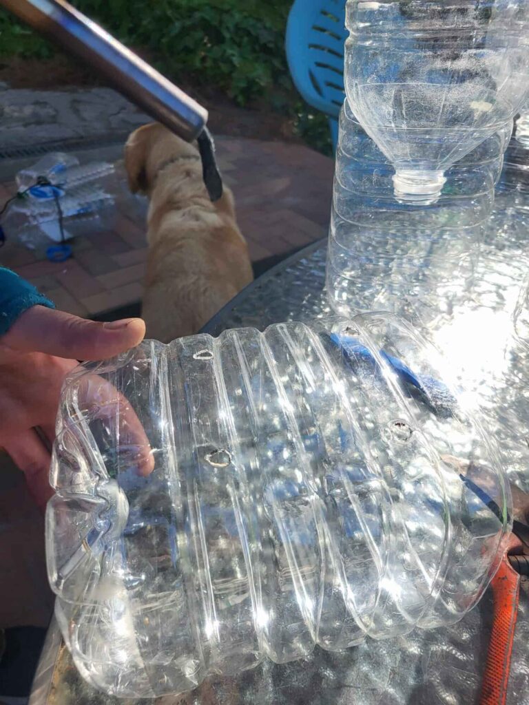 hacer agujeros a la botella